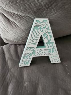 Decorative Letter A with Floral Cutout Design