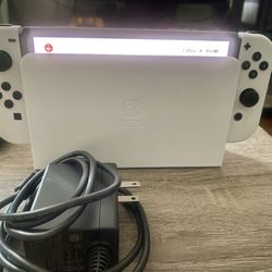 White Nintendo Switch OLED System Trading For Your Retro Video Game Collections