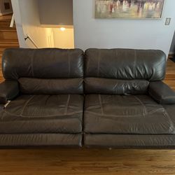 Leather reclining sofa and love seat