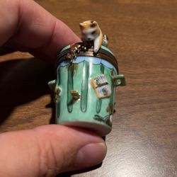 Limoges porcelain cat on trash can 