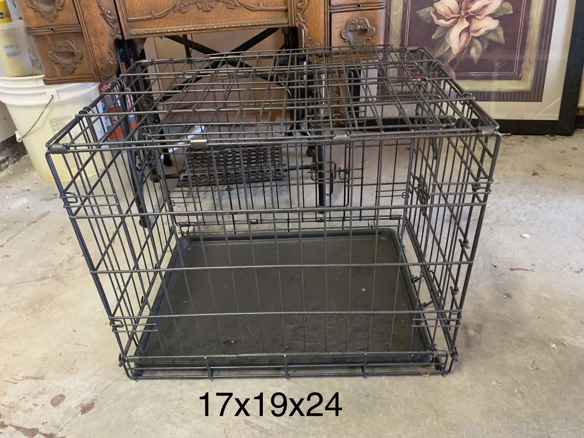 Estate Sales: black metal medium dog crate