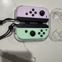Nintendo Switch Joy-Cons – Pastel Purple & Green + Extras – Excellent Condition + Charging Grip