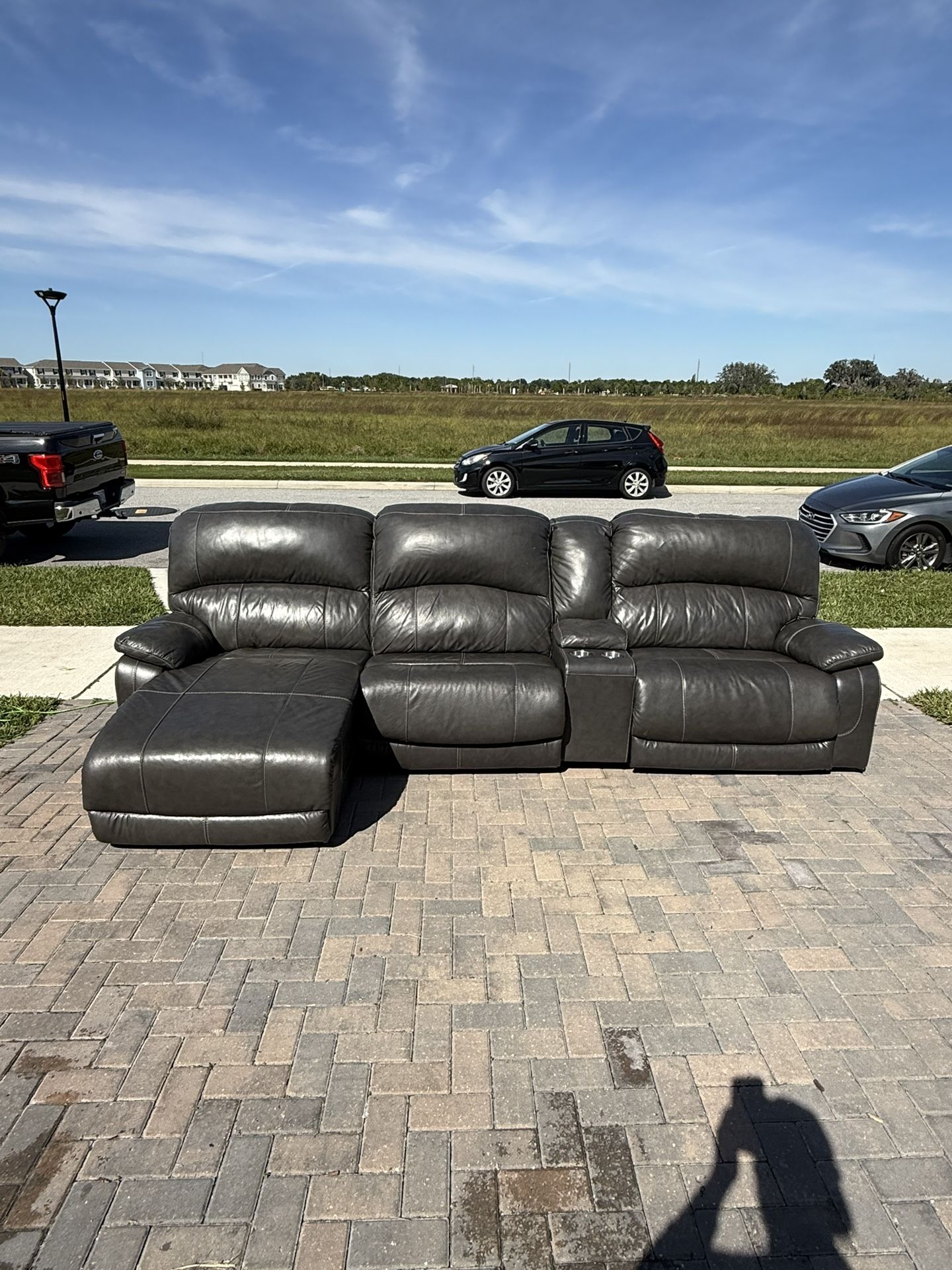 Free Delivery- Grey Leather Electric Recliner couch with chaise