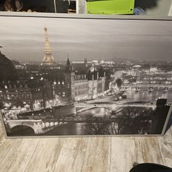 Sadly selling my Eiffel Tower canvas. Too big for my new place. 55Wx39.5T silver frame. $80