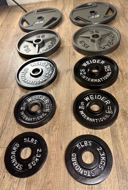 Olympic Weight Plates: 45s, 35s, 25s, 10s and 5s. Total: 236 lbs.