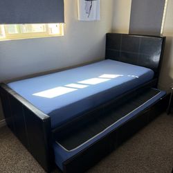 Single bed with pull out bed.