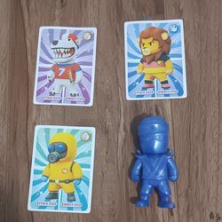 3 stumble guys cards and blue ninja figure.