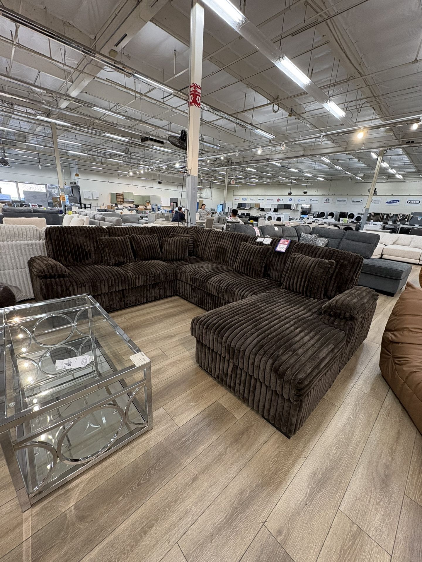 LARGE CHOCOLATE CORDUROY SECTIONAL WITH PULL OUT SOFA BED AND STORAGE CHAISE