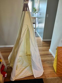 Kids play teepee