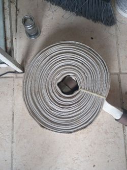 Coiled Flat Fire Hose and nozzle
