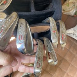 These are vintage Ben Hogan Apex Plus forged irons, likely from the early 2000s.