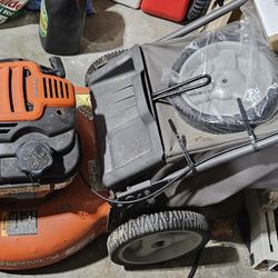 Orange Husqvarna Push Mower LC121P