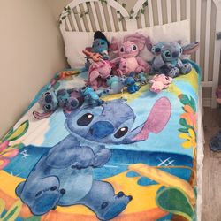 Stitch blanket and stuffed animals