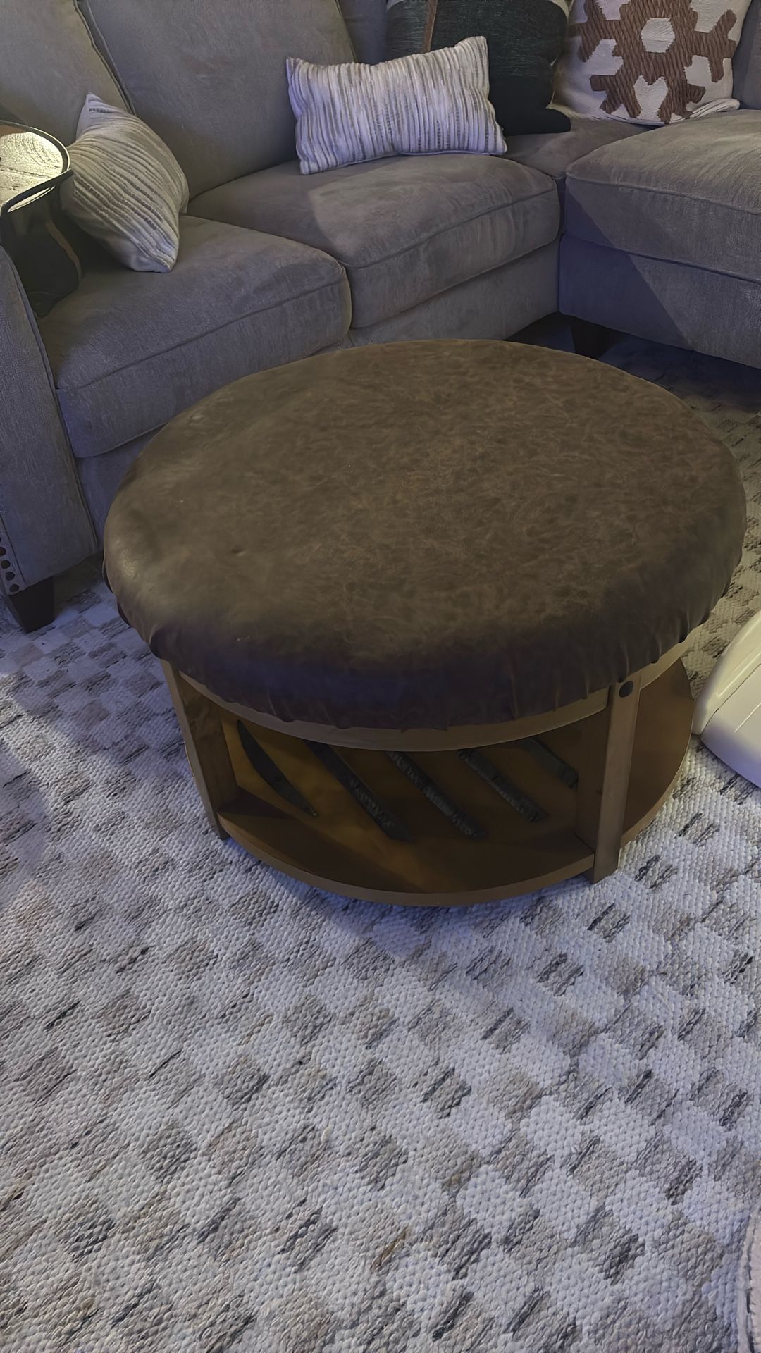 round Wood And Leatherette Coffee Table