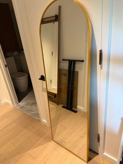 Gold floor mirror