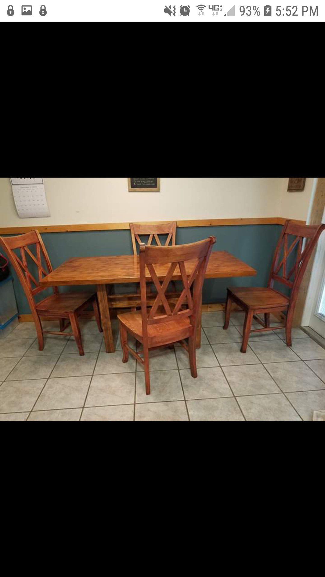 All wood dining table and 4 chairs