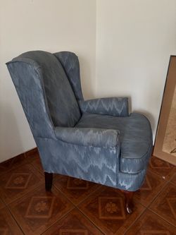 Blue Wingback Armchair with Ikat Pattern