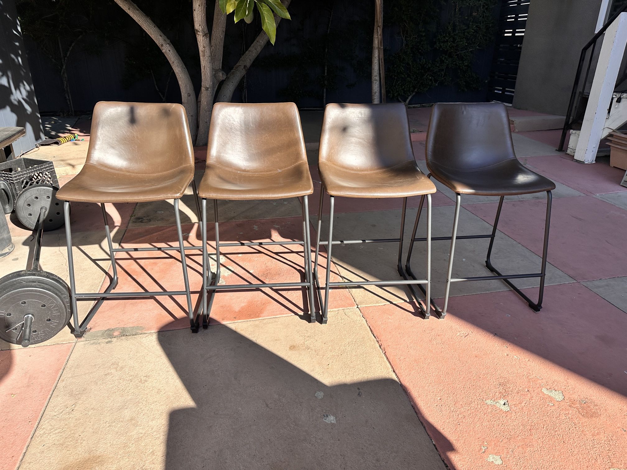 Four Vegan Leather bar stools