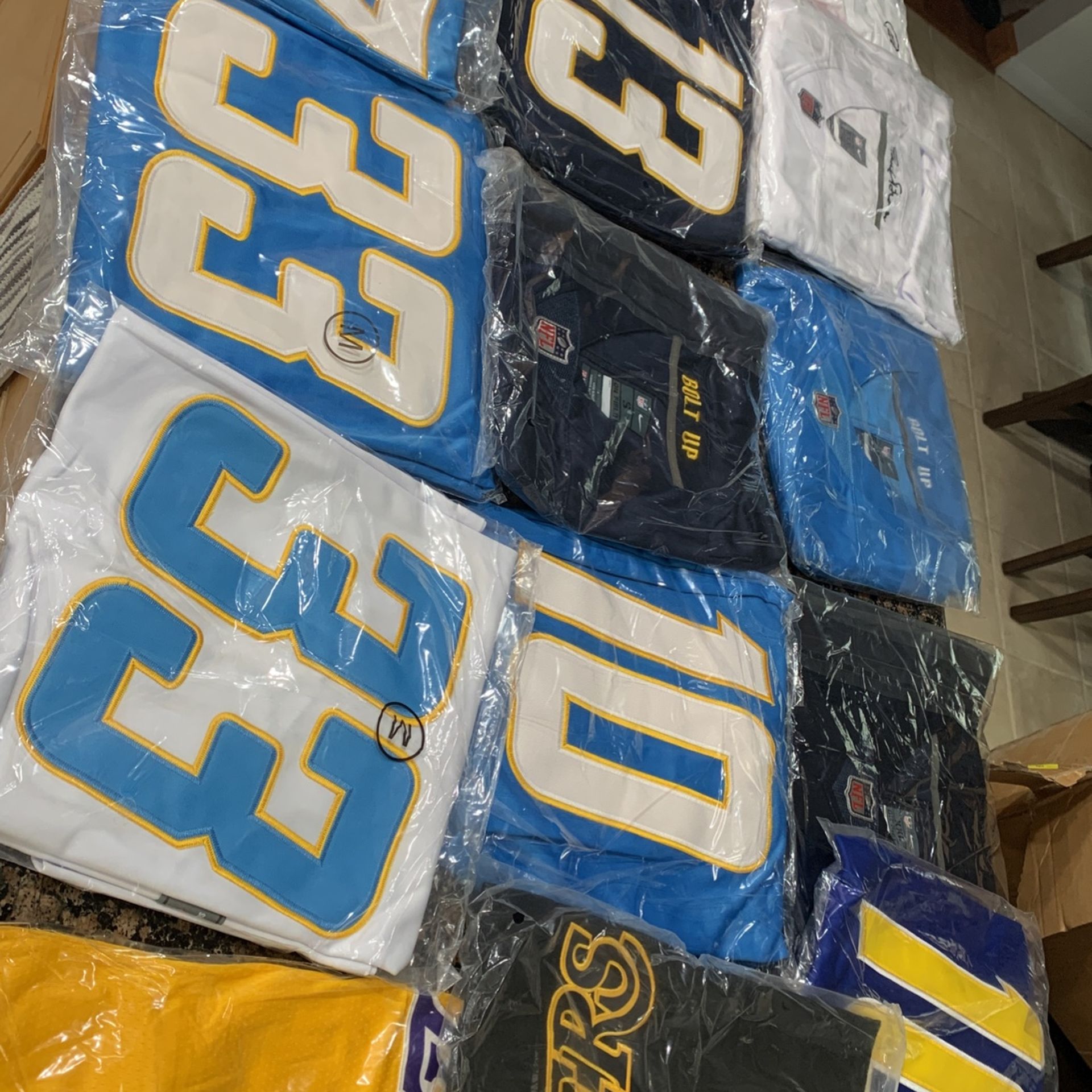 NFL FOOTBALL JERSEYS, BASEBALL JERSEYS , BASKETBALL JERSEYS 100% STITCHED AND EMBROIDERED ON FIELD JERSEYS  IN STOCK , CHARGERS JERSEYS , YOU NAME IT