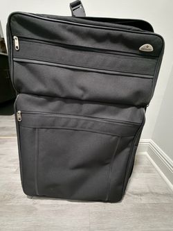 Samsonite Large Black Rolling Luggage