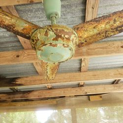 Old rusty green Vintage 3 bade metal ceiling fan