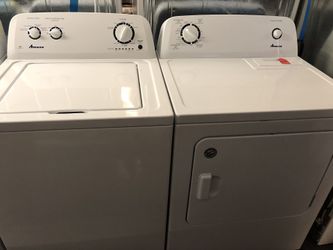 Used Amana High Efficiency washer and dryer set. 1 year warranty