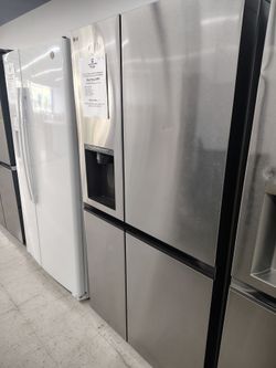 $999 LG 27 Cu Ft side by side refrigerator