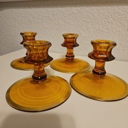 Four Amber Candle Holders 
