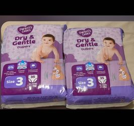 Brand new 3 packages of baby diapers ( never open ) still sealed