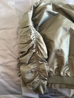 Men’s or women’s jacket, heavy duty and a taupe green