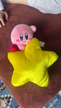 ⭐ Kirby Plush Hugging A Giant Star ⭐  Official Kirby plush by Furyu — aka the company responsible for making adults spend way too much money in Japane