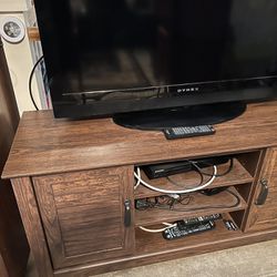 Nice Tv Stand And Tv With Remote