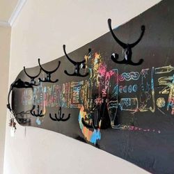 Rome Gang Plank 155cm snowboard turned into a unique wall mounted hat & coat rack