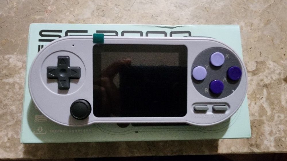 Portable Console +10,000 Games 