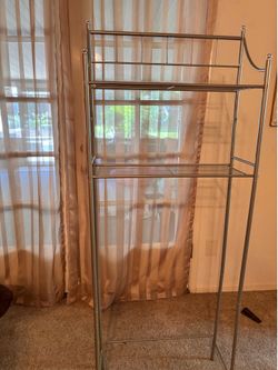 Nickel plated shelf over toilet stool