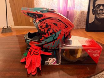 Dirt bike helmet with gloves and googles