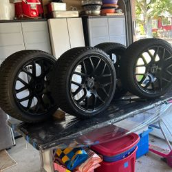 Four brand new Bridgestone tires with wheels