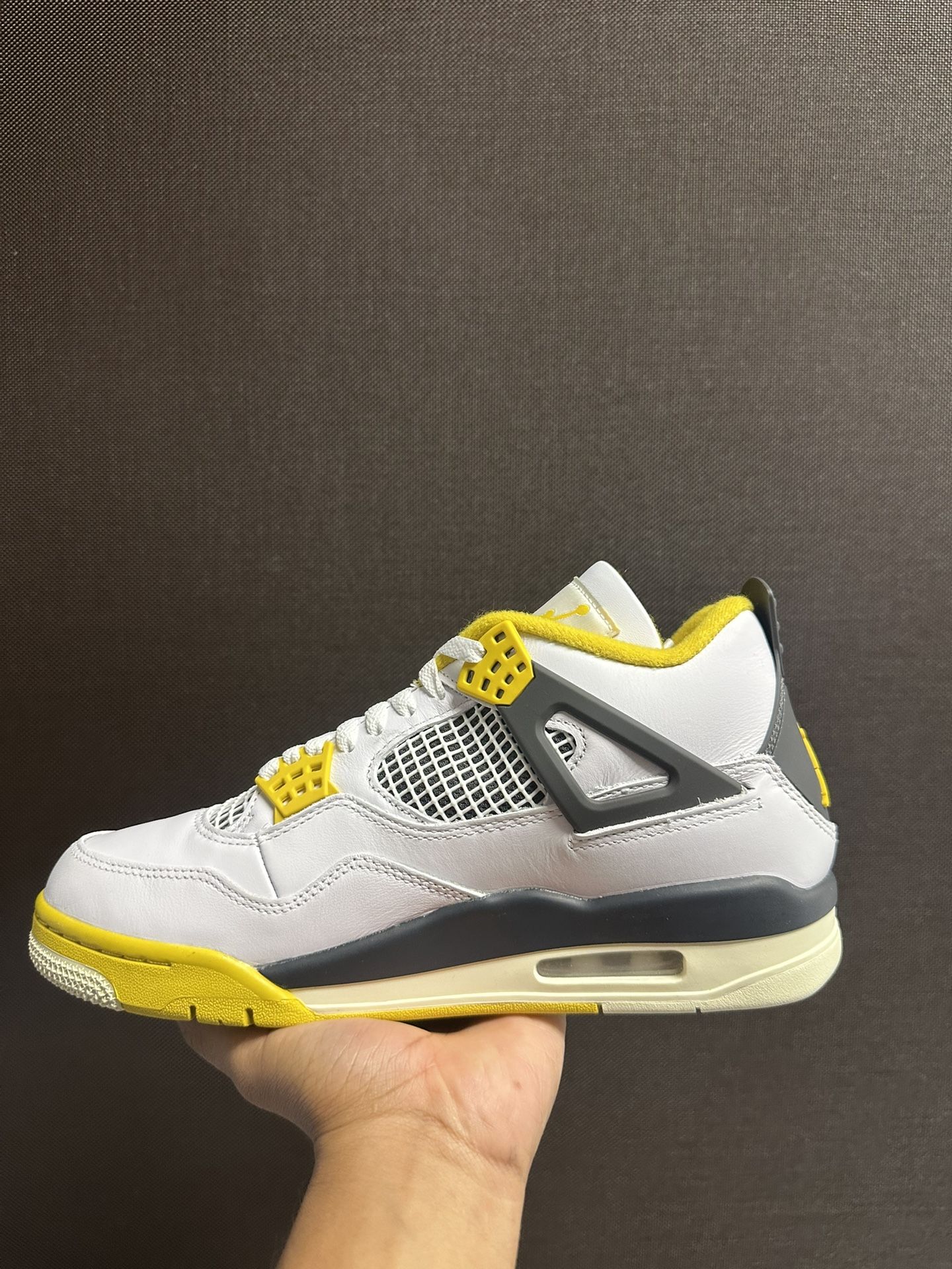 Jordan 4 Retro “Vivid Sulfur”