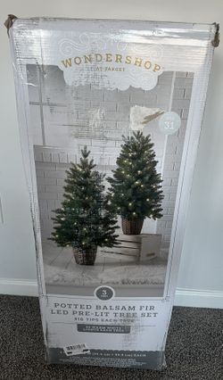 set of pre-lit artificial Christmas trees Potted Balsam Fir LED Pre-Lit Tree Set from Wondershop.