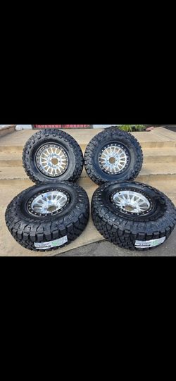 17" KMC KM445 Impact beadlocks w/ 35" Toyo Open Country RT Pro