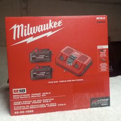 Milwaukee BATTERY AND CHARGER)FORGE STARTER KIT/ BRAND NEW FOR  $325