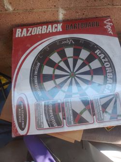 Dart board. New in box