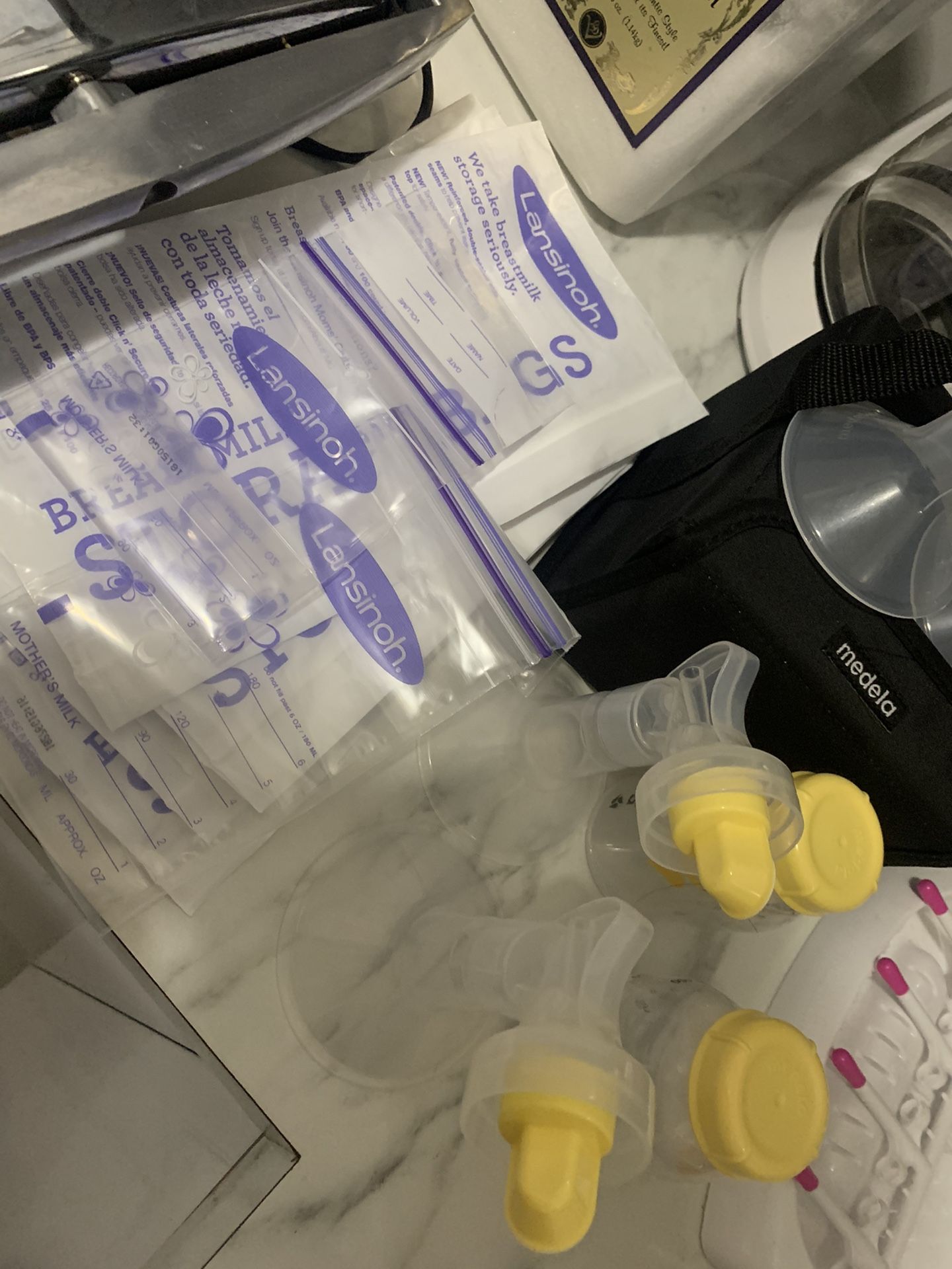 Medela BreastPump & Lansinosh Breadsmilk StorageBag Ask For Price