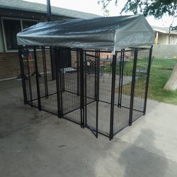 Double dog kennel each side is 4 ft by 4 ft total size of the whole kennel is 4 ft by 8 ft with shade brand new