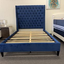 Queen bed frame in blue velvet