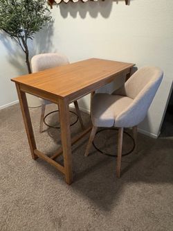 Counter Height Table and Pair of Swivel Stools - $100