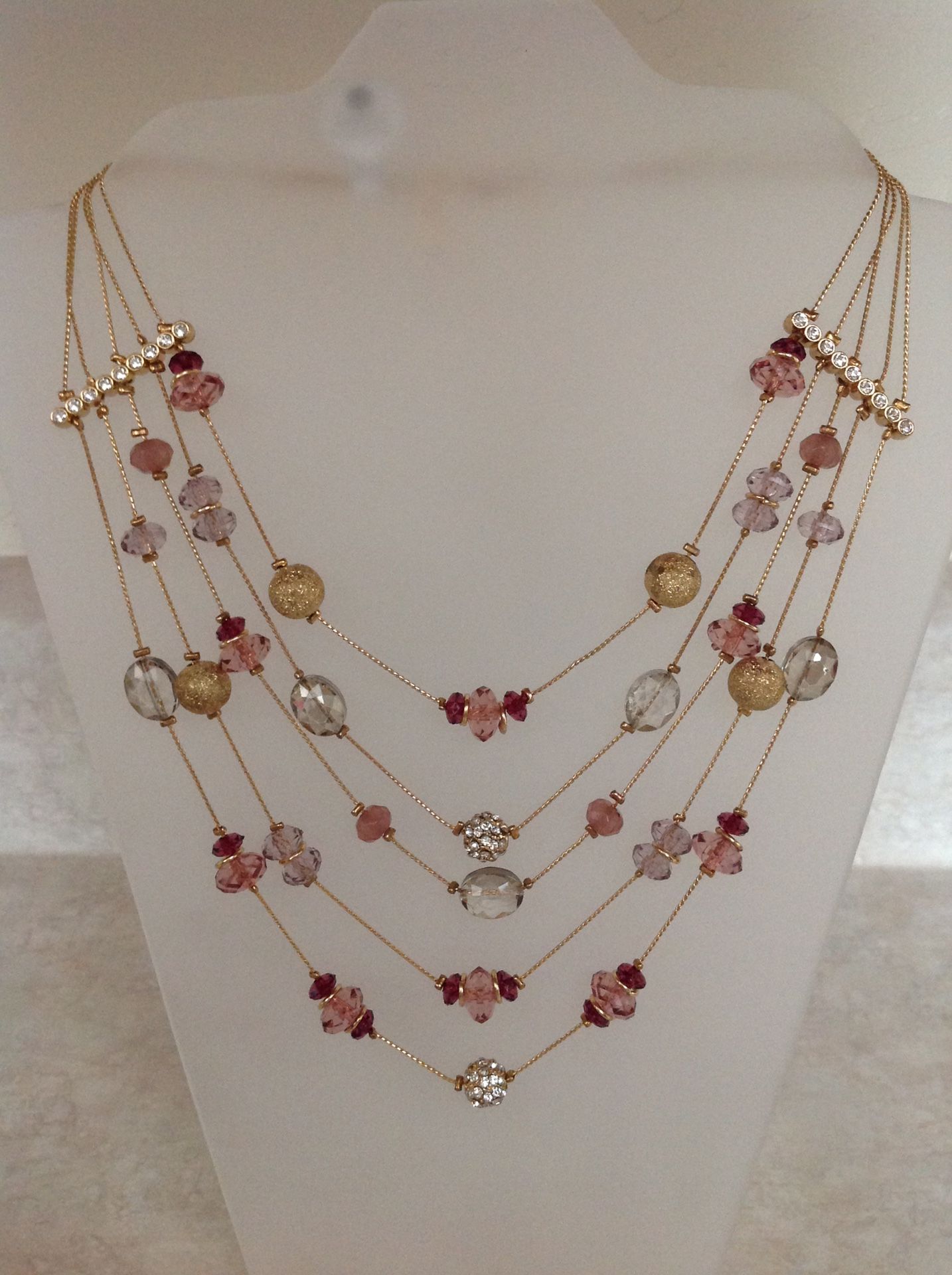 Gold Tone 5 Strands with Plum Crystals