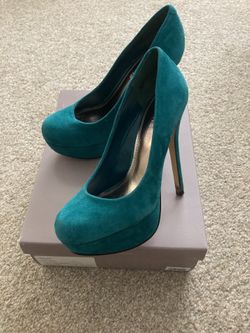 Turquoise suede pumps