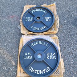 PRICE IS FIRM 
New in Box 
Olympic Plates-45lbs
Boxes are Unopened  