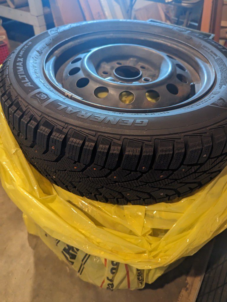 15" Studded Snow Tires (Lightly Used)